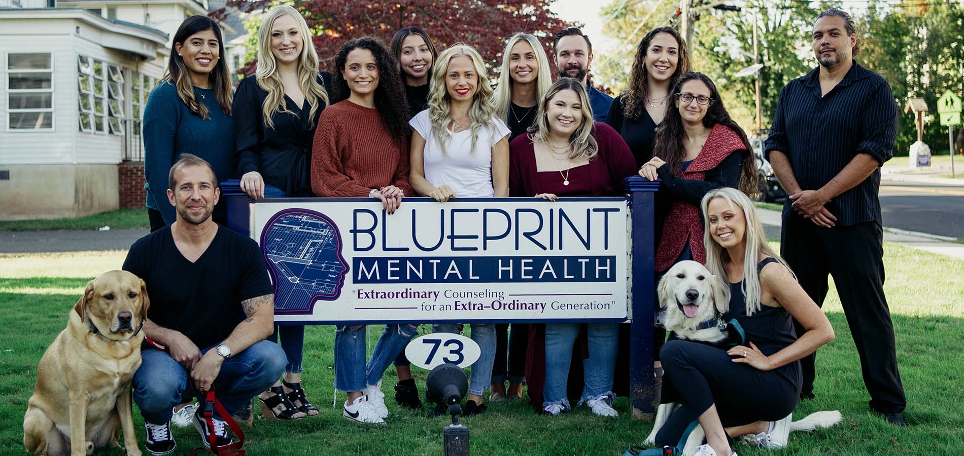 The Blueprint Mental Health staff with our Lawn Sign